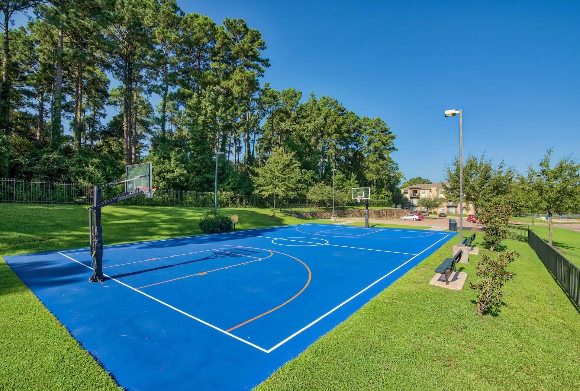 outdoor basketball court at republic at sam houston apartments