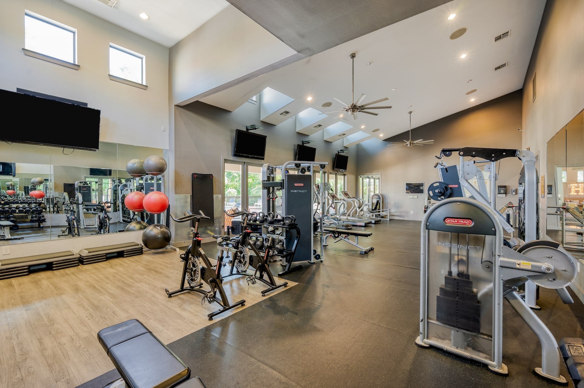 exercise room at republic at sam houston apartments