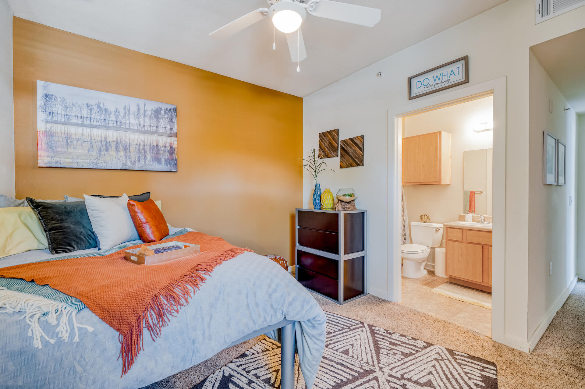 bedroom with an attached bathroom at republic at sam houston apartments